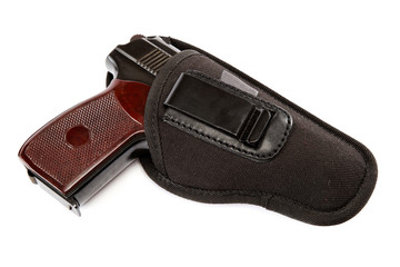 Gun in a holster on white background.