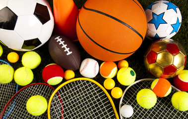 Assorted sports equipment and grass