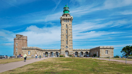 Tourists visiting Cap Frehel phare, France.