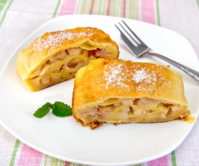 Strudel with pears on tablecloth