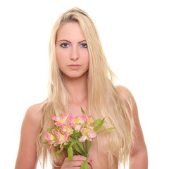 Obraz na płótnie Canvas portrait of a beautiful blonde with flowers