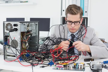 Computer engineer working on broken console