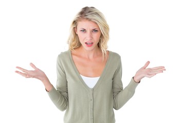 Fototapeta premium Pretty young blonde looking confused