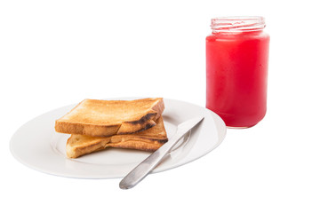 Strawberry jam and bread toast on a plate over white background 