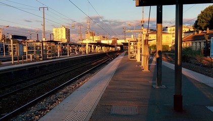 Fototapeta na wymiar Sunset on suburban station