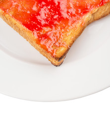 Bread toast with strawberry jam on white plate