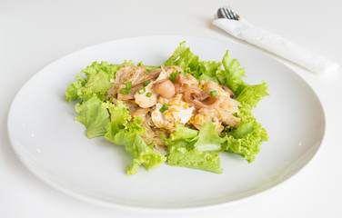 Stir fried fresh rice-flour noodles with chicken and egg.