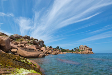 Fototapeta na wymiar Ploumanach rock beach on a sunny day. Brittany, France.