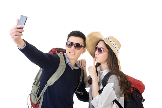 Asian Young Traveling Couple Selfie