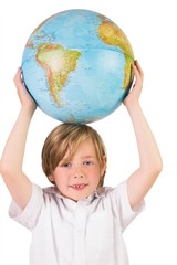 Student learning geography with globe