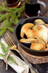Mushroom Boletus over Wooden Background