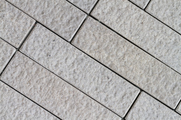 rough grey tiles wall