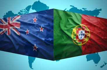 Waving New Zealand and Portuguese flags