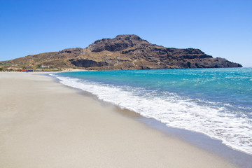 seashore with blue transparent water on Crete island in Greece