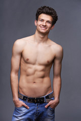 Fototapeta premium Male fashion model with modern haircut