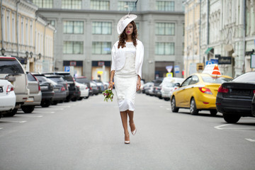 Fototapeta premium Young beautiful model in a stylish designer clothes