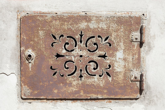 old ornamental wall lid