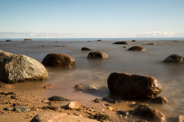 View of a rocky coast in the morning. Long exposure shot.