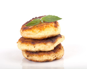 cheese pancakes with mint isolated on white background