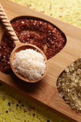 Different sea salt on table, close up