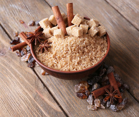 Brown sugar cubes, reed and crystal sugar in bowl