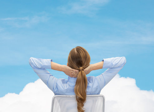 Businesswoman Sitting On Chair From Back