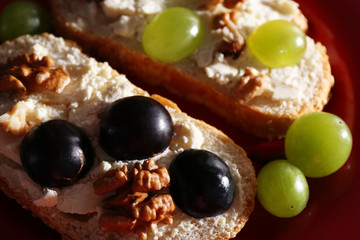 tasty bread with grape and cheese, close up
