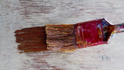 Painting coat  wooden stairs at home with lacquer