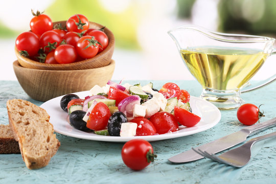 Greek salad in plate and bread