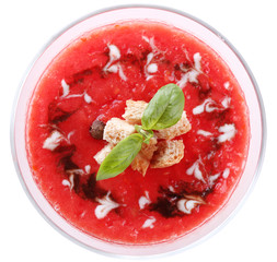Gazpacho soup in glass bowl isolated on white