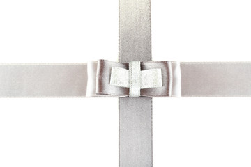 grey and silver ribbon and bow isolated on white