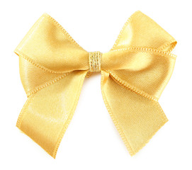 Yellow silk bow isolated on white