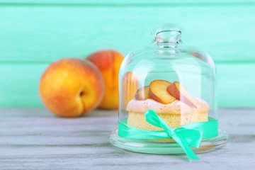 Tasty mini cake with fresh peach