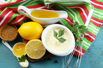 Mayonnaise ingredients on wooden background