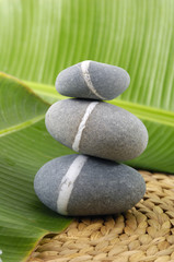 Zen stones on banana leaf