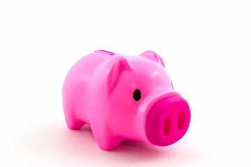 Pink piggy bank saving.