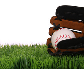 Baseball in Glove on Green Grass, isolated on white.