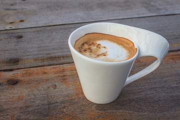  cappuccino coffee on wooden table