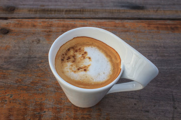  cappuccino coffee on wooden table