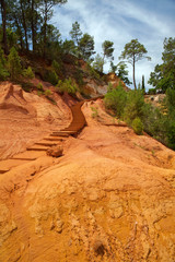 The view of sienna cliffs in outdoor park in Provence, France