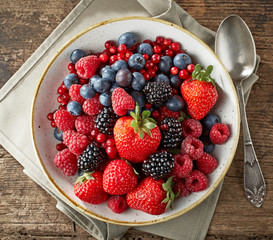 bowl of fresh berries © Mara Zemgaliete