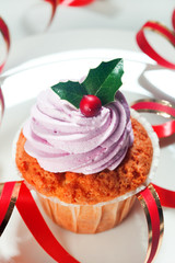 Christmas cupcake with swirls of creamy strawberry