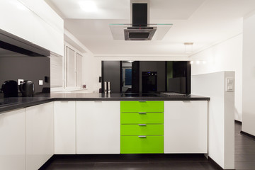 Interior of black and white kitchen
