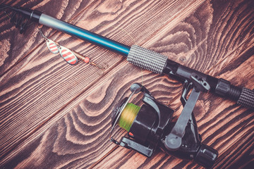 fishing tackle on a wooden table