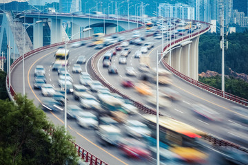 Naklejka premium busy traffic closeup and vehicles motion blur
