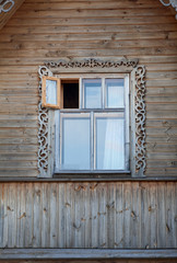 Obraz na płótnie Canvas Wooden frame window with opened leaf in house