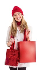 Pretty blonde holding shopping bags