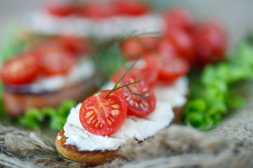 toast with cheese and cherry tomatoes