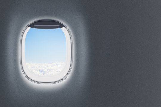 Fototapeta Airplane or jet window on wall with blank space