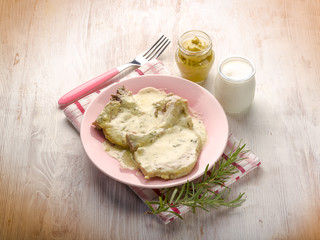 chump with mustard and yogurt sauce
